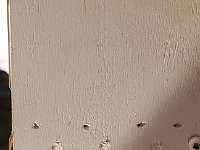 2022-03-21 08.49.23  Pocket screws hold the frame sides on to the top and bottom frame panels.  I use a Kreg Pocket Screw setup.  The rectangular holes are brad nails that affix the column guides to the top and bottom.